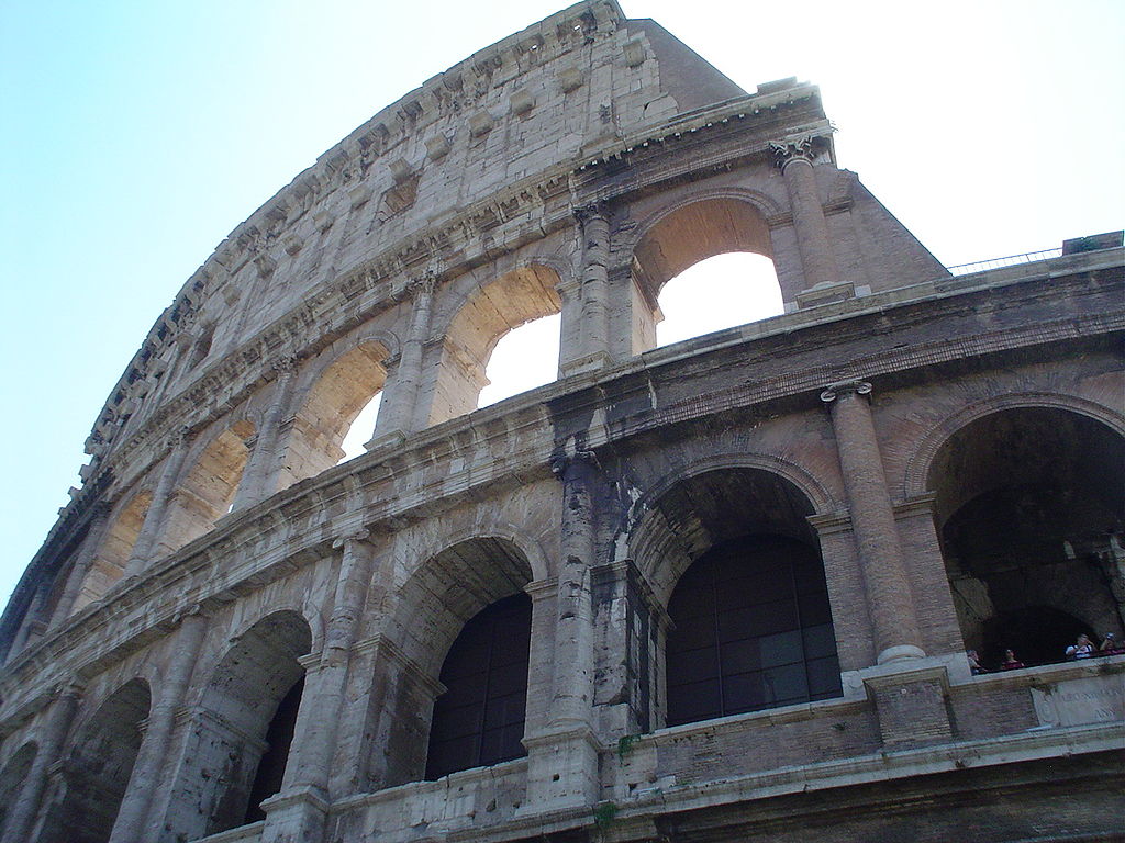 This is a picture of the wall of the Coliseum taken from close up. 